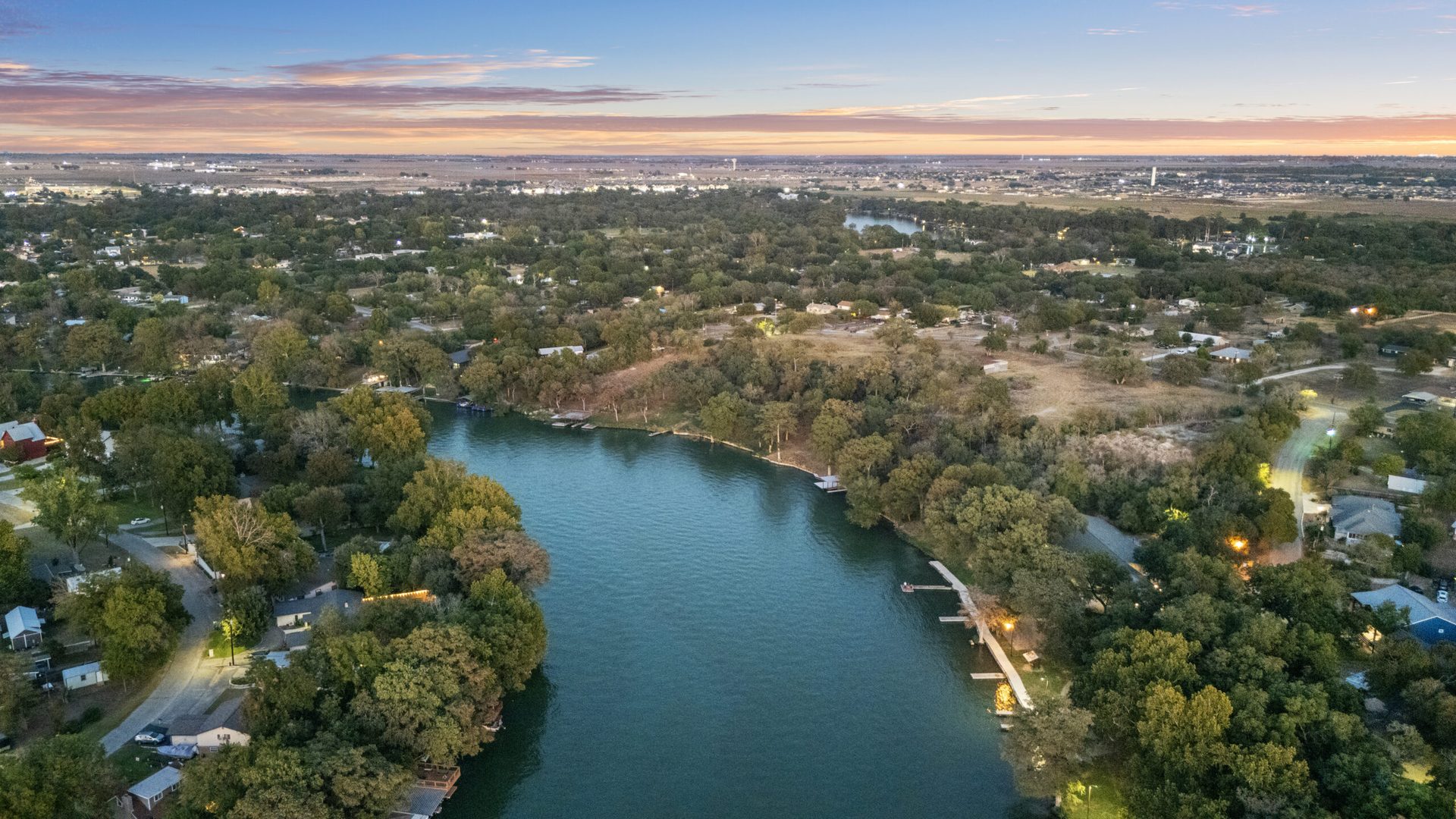 Aerial view of Central Texas neighborhoods and Hill Country terrain